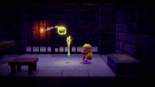 Zelda is stood talking to a floating, sentient orb of some kind, a staff floating in front of her in The Legend of Zelda: Echoes of Wisdom.
