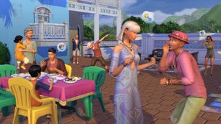 A group of neighbours socialise together in an apartment building courtyard.